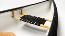 Wood /web extra wide seat outfitted in a canoe